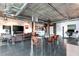 Spacious living room with a view of an open-plan kitchen, dining area, and modern design at 10 N Summerlin Ave # 14, Orlando, FL 32801