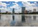 City skyline reflected in a lake with swans swimming at 10 N Summerlin Ave # 14, Orlando, FL 32801