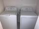 Bright laundry room with a white washer and dryer, ready for convenient in-home laundry at 1003 E 10 St, Apopka, FL 32703