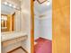 This walk-in closet features ample shelving and storage space at 1181 Pine Ln, St Cloud, FL 34771