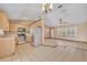 Bright kitchen with stainless appliances open to the living area at 1181 Pine Ln, St Cloud, FL 34771