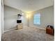 Bedroom with cozy decor, comfortable carpet and window with blinds at 12938 Maribou Cir, Orlando, FL 32828