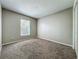 Cozy bedroom with natural light and wall to wall carpeting at 12938 Maribou Cir, Orlando, FL 32828