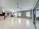 Open living room view showcasing seamless transition to the kitchen area at 12938 Maribou Cir, Orlando, FL 32828