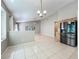 Spacious living room with lots of windows and tile flooring at 12938 Maribou Cir, Orlando, FL 32828