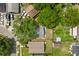 This aerial view shows the property's layout and its location within a neighborhood setting with mature trees at 1358 Brookebridge Dr, Orlando, FL 32825