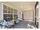 Relaxing screened porch with comfortable seating and a view of the outdoors at 1358 Brookebridge Dr, Orlando, FL 32825