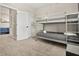 This bedroom is equipped with bunk beds and a doorway, offering both relaxation and connectivity to other areas at 1409 Bellamy Dr, Reunion, FL 34747