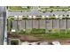 Aerial view of the property, located in a vibrant community with easy access to amenities and well-maintained landscaping at 165 Lavenna Ave, St Cloud, FL 34771