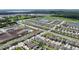 Aerial view of the community, showing the layout with water features, landscaping, and convenient roadway access at 165 Lavenna Ave, St Cloud, FL 34771