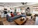 Spacious living area with a view of the kitchen and dining space with natural light at 165 Lavenna Ave, St Cloud, FL 34771