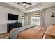 Comfortable bedroom features a large window, modern decor, and plenty of natural light at 165 Lavenna Ave, St Cloud, FL 34771