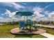 Playground with colorful equipment, creating a fun and safe environment for children to play and socialize outdoors at 165 Lavenna Ave, St Cloud, FL 34771