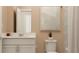 Clean bathroom featuring a white vanity, a framed mirror, neutral paint, and shower with curtain at 2035 Rider Rain Ln, Apopka, FL 32703