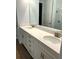 Bathroom with double sink vanity, quartz countertop, and modern fixtures at 2042 Key Bay Trl, Kissimmee, FL 34747