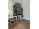 Office with shelves and window providing natural light for organized storage and work at 2042 Key Bay Trl, Kissimmee, FL 34747