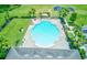 Aerial view of the resort style community pool and amenities in a quiet neighborhood at 2149 Tudor Rose Dr, Sanford, FL 32773