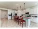 Spacious kitchen featuring a center island with barstool seating and modern appliances at 2149 Tudor Rose Dr, Sanford, FL 32773