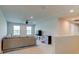 Open concept living room featuring neutral tones and large windows offering plenty of natural light at 2149 Tudor Rose Dr, Sanford, FL 32773