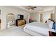 Bright main bedroom with tray ceiling, generous proportions, and modern fixtures at 2149 Tudor Rose Dr, Sanford, FL 32773