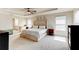 Spacious main bedroom suite with tray ceiling, plush carpet, and bright natural light at 2149 Tudor Rose Dr, Sanford, FL 32773