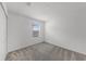 This bedroom features neutral walls, carpet, a window, and closet at 2563 Relaxing Ln, Kissimmee, FL 34744
