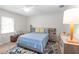 Cozy bedroom featuring a comfortable queen-sized bed, neutral decor, and ample natural light at 264 Agnes Ave, Longwood, FL 32750