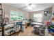 Large bonus room with many craft stations and natural light from the many windows at 264 Agnes Ave, Longwood, FL 32750