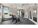 Bright gym features stationary bikes, free weights, and ample space for a complete workout at 2665 Petition Ln, Kissimmee, FL 34746