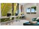 Bright community office space features multiple computer stations, comfortable seating, and a large window at 2665 Petition Ln, Kissimmee, FL 34746