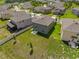 An elevated view showcases the property's lawn, neighboring houses, and landscaping at 2817 Muller Oak Loop, Ocoee, FL 34761