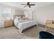Relaxing main bedroom with natural light and plush carpeting at 2817 Muller Oak Loop, Ocoee, FL 34761