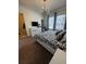 Cozy bedroom with a large window, providing plenty of natural light at 306 Captiva Dr, Davenport, FL 33896