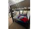 This bedroom features a bunk bed and playful decor, providing a fun and functional space for rest and play at 306 Captiva Dr, Davenport, FL 33896