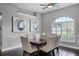 Well-lit dining room with six chairs and modern decor at 315 Lake Rd, Lake Mary, FL 32746