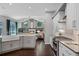 Open kitchen featuring an island, stainless appliances, and seamless flow into the living room at 315 Lake Rd, Lake Mary, FL 32746