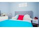 Relaxing bedroom with a plush bed, stylish decor, and a cozy atmosphere perfect for restful nights at 339 Colony Ct, Kissimmee, FL 34758