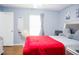 Comfortable bedroom featuring stylish bed, bright window, and ample space at 339 Colony Ct, Kissimmee, FL 34758