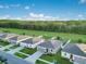 A great aerial view of the neighborhood and nearby green space at 3408 Curlew Ave, Leesburg, FL 34748