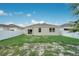 The well maintained yard is completely fenced for privacy at 3408 Curlew Ave, Leesburg, FL 34748