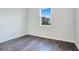 A nice bright bedroom with durable flooring and a window at 3408 Curlew Ave, Leesburg, FL 34748
