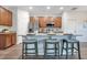 Features stainless steel appliances, a breakfast bar with comfortable seating, and wood cabinets at 3408 Curlew Ave, Leesburg, FL 34748