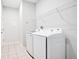 This spacious laundry room is equipped with new washer and dryer at 3408 Curlew Ave, Leesburg, FL 34748