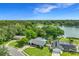 Picturesque aerial shot of the home featuring its backyard pool and proximity to the lake at 3417 Pershing Ave, Orlando, FL 32812