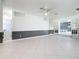 Spacious basement area features tile floors and access to the other rooms at 3417 Pershing Ave, Orlando, FL 32812