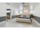 Spacious bedroom with tile flooring, recessed lighting, and a calming neutral color palette at 3417 Pershing Ave, Orlando, FL 32812