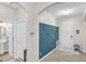 Hallway featuring a decorative accent wall, and entry to the powder room at 3472 Gretchen Dr, Ocoee, FL 34761