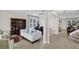 Bright living room showcasing an open floor plan with tile flooring and stairs leading to the second level at 3472 Gretchen Dr, Ocoee, FL 34761