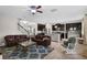 Open-concept living space features a modern kitchen with a breakfast bar and a comfortable seating area at 3472 Gretchen Dr, Ocoee, FL 34761