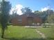 View of a backyard featuring a patio area perfect for outdoor dining and relaxation at 3700 Washington St, Sanford, FL 32771